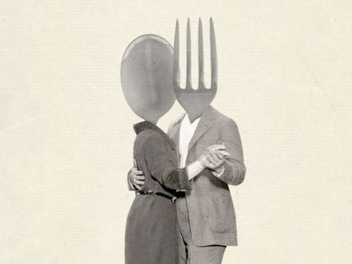 A surreal image of a couple dancing, where the man's head is replaced with a fork and the woman's head with a spoon.
